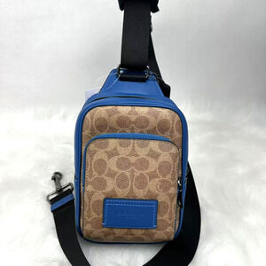 Coach Racer Sling Pack In Colorblock Signature Canvas Tan/Pacific Bright Mine
